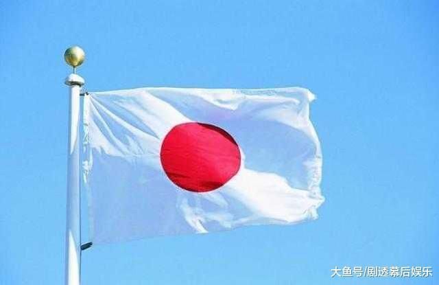 旗面为白色,正中有一轮红日的太阳旗为日本国旗.