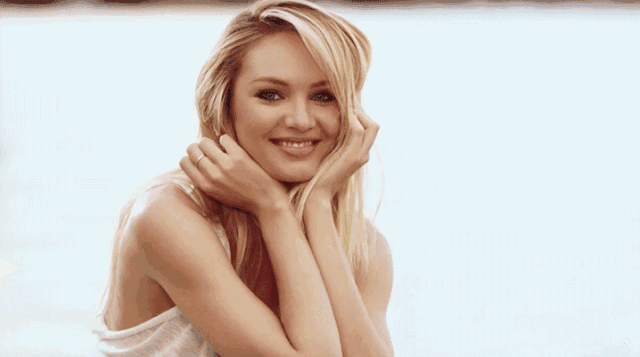 这个让人羡慕嫉妒恨的女人 叫candice swanepoel 因为有着甜出天际的