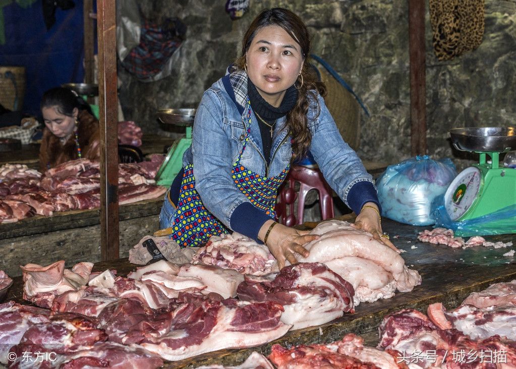 越南女屠户杀猪卖肉,干得比男人利索多了,没有半点女人的娇气