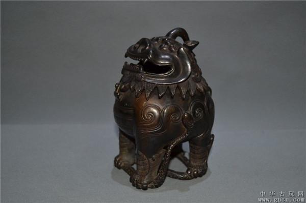 龙生九子之五:狻猊 狻猊,形似狮子,排行第五,平生喜静不喜动,好坐,又