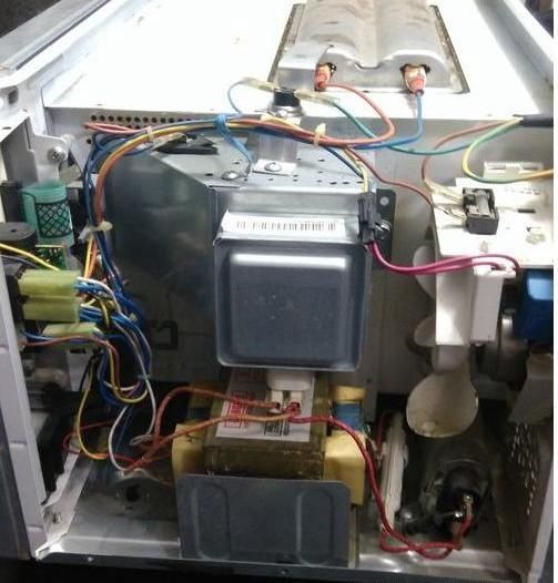 微波炉高压电容器短路造成不工作的故障分析与维修方法