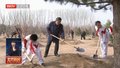 习近平在参加首都义务植树活动时强调 全民植树增绿 共建美丽中国