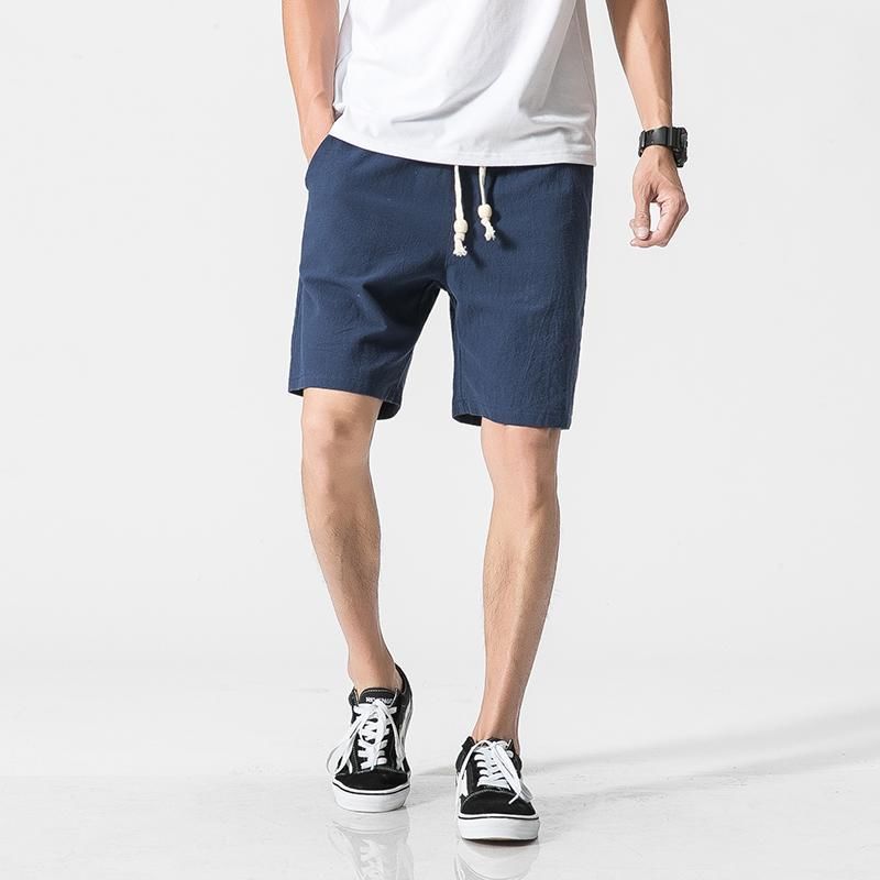 夏季新款男士休闲短裤,搭配白色短袖、帆布鞋