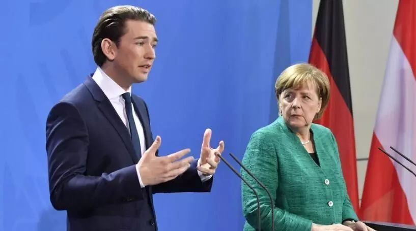 奥地利新总理访问德国,气场十足,和默姐干了一