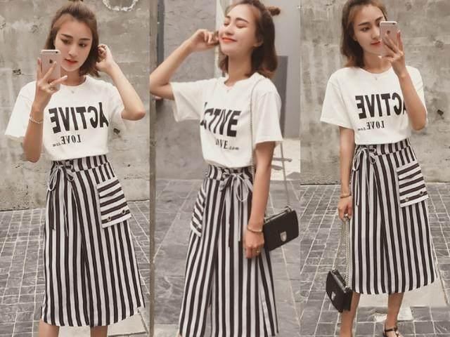 今年夏天,很流行穿长款T恤搭配半身裙,这样的
