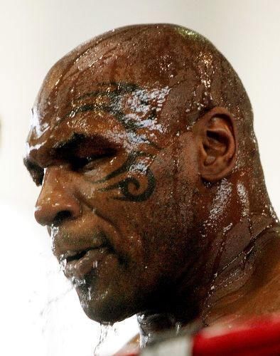 拳王泰森为什么把纹身图案纹在脸上,原来是有
