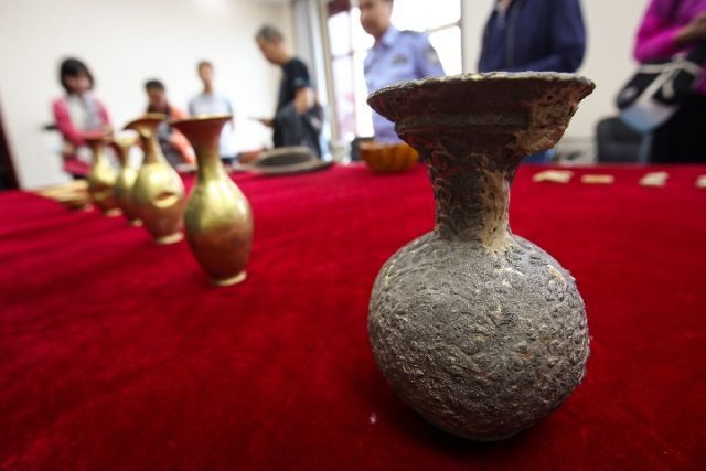 从九层妖塔旁盗走的文物