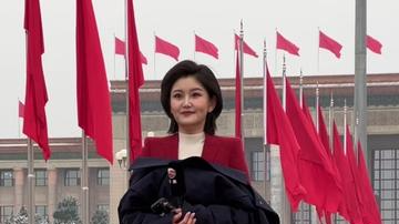 3月5日，雪后的天安门广场，瑞雪初栖。两会上的媒体人。